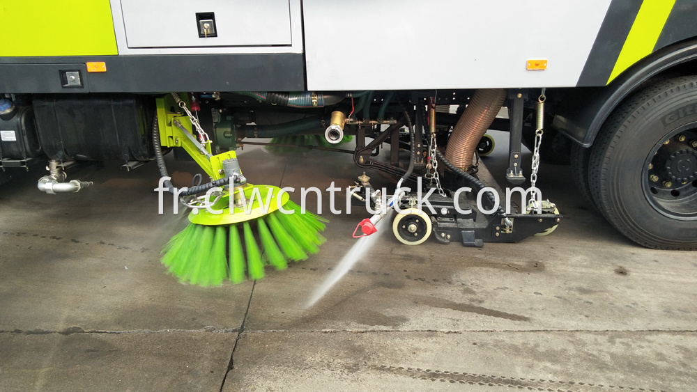 street sweeping truck side spraying